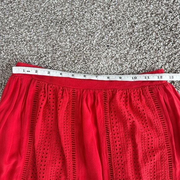 SOLITAIRE | Red Pleated Skirt with Eyelet cut out - Picture 7 of 8